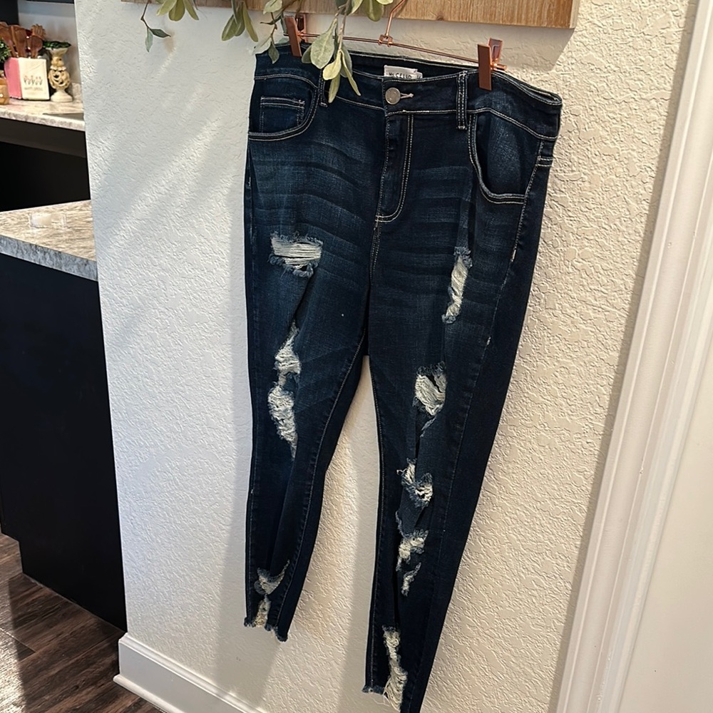 Brand New Distressed Dark Blue Jeans. No tags.